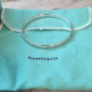 Tiffany & Co. Sterling silver logo bangle